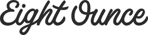 The logo for Eight Ounce, featuring the brand name in a dark gray cursive script font on a solid white background.